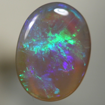 SOLID CRYSTAL OPAL Rolling flashes of green to purple